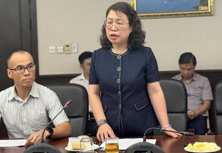 Kho bạc Nhà nước 2025: Tinh gọn bộ máy, hiện đại hóa quản lý ngân sách 1 Bà Ngô Thị Nhung, Phó Giám đốc KBNN trao đổi thông tin - Ảnh: VGP/HT