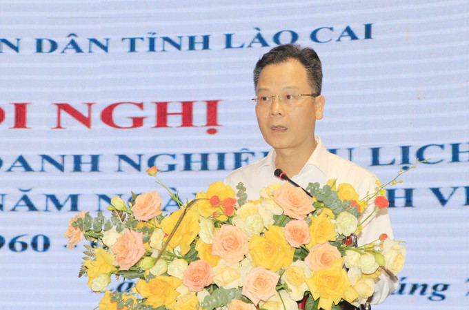 Phát triển du lịch thành ngành kinh tế mũi nhọn tại Lào Cai 1 Phó Chủ tịch UBND tỉnh Lào Cai Nguyễn Thành Sinh phát biểu tại hội nghị. (Ảnh Báo Tin tức và Dân tộc - TTXVN)