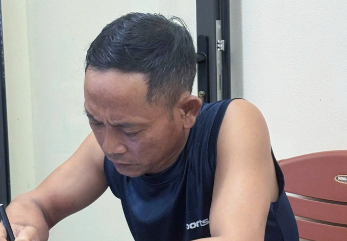 Bị can Tân tại cơ quan điều tra. Ảnh: Hùng Lê