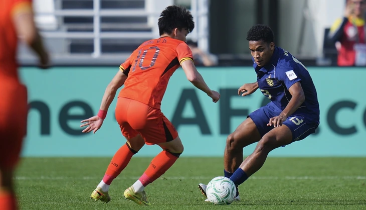 U23 Thái Lan (áo xanh) hoàn toàn bế tắc và bị loại từ vòng bảng - Ảnh: AFC